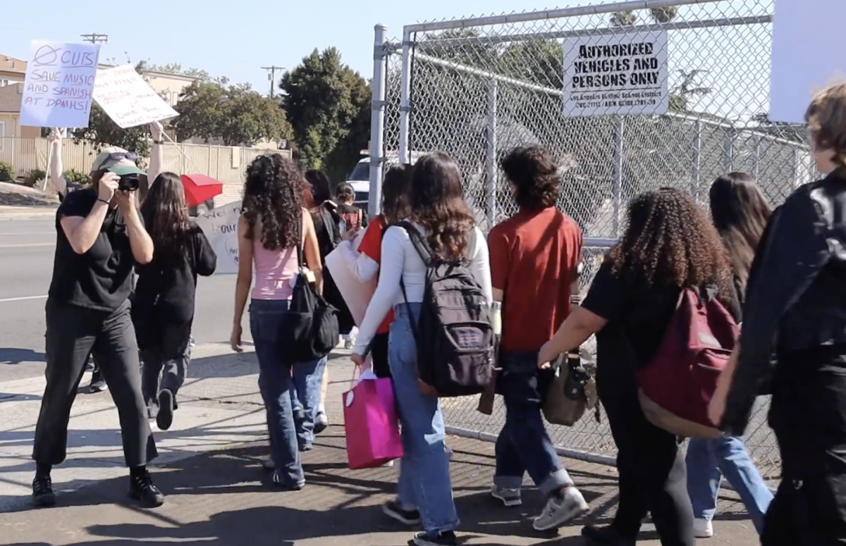 Students walk out demanding the reinstatement of teachers